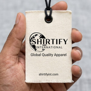Canvas cotton hang tag label design with black logo print, metal eyelet and string for clothing brand packaging